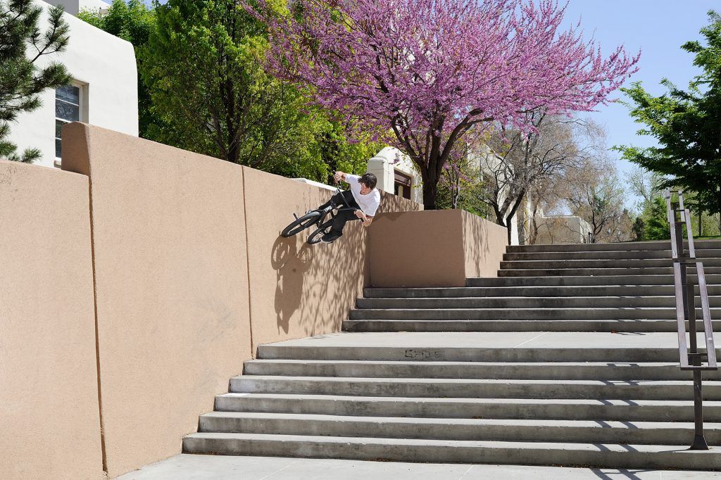 Chase Dehart, BMX Street Rider, wall riding over stairs.