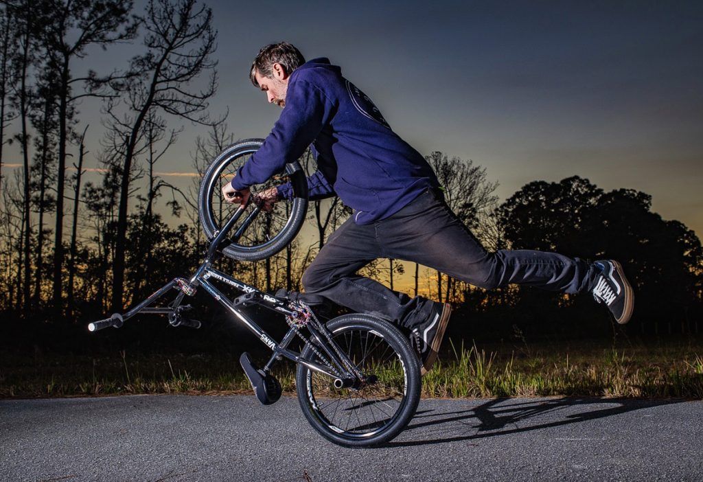 Chad DeGroot, BMX Freestyler, doing a darkside kneely trick